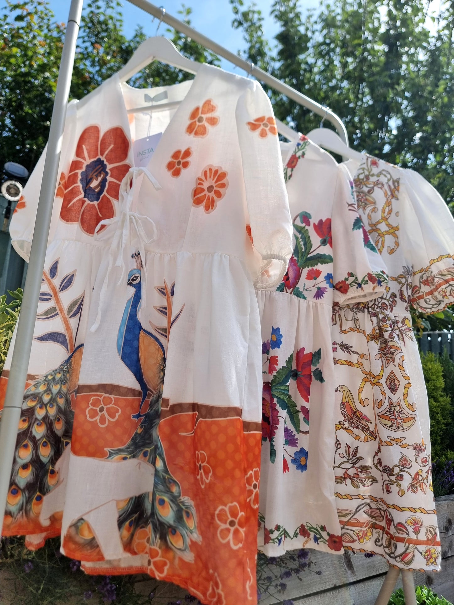 LILY TIE FRONT SMOCK DRESS - PEACOCK